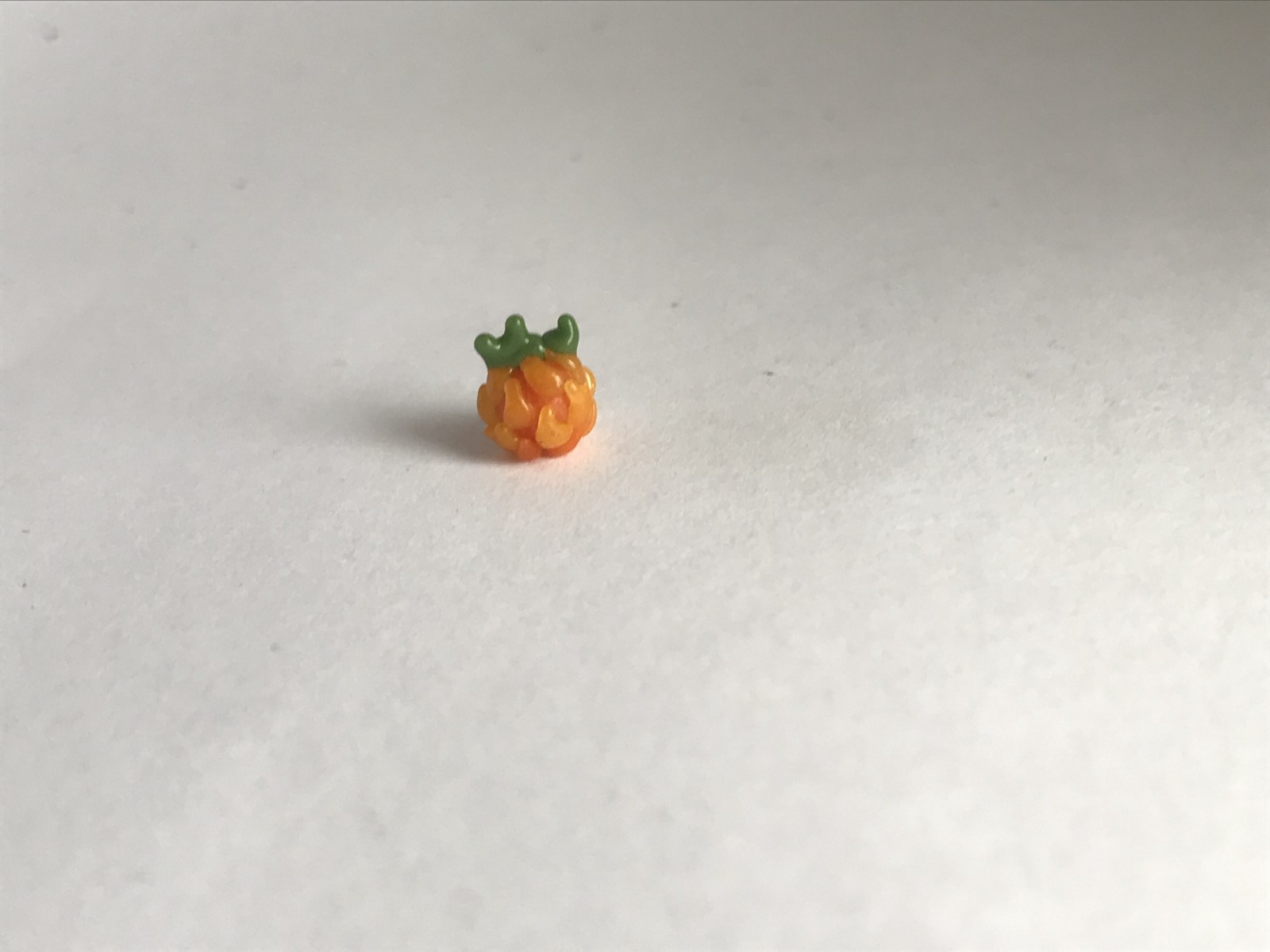 Mini handcrafted borosilicate glass art bead Burning fruit