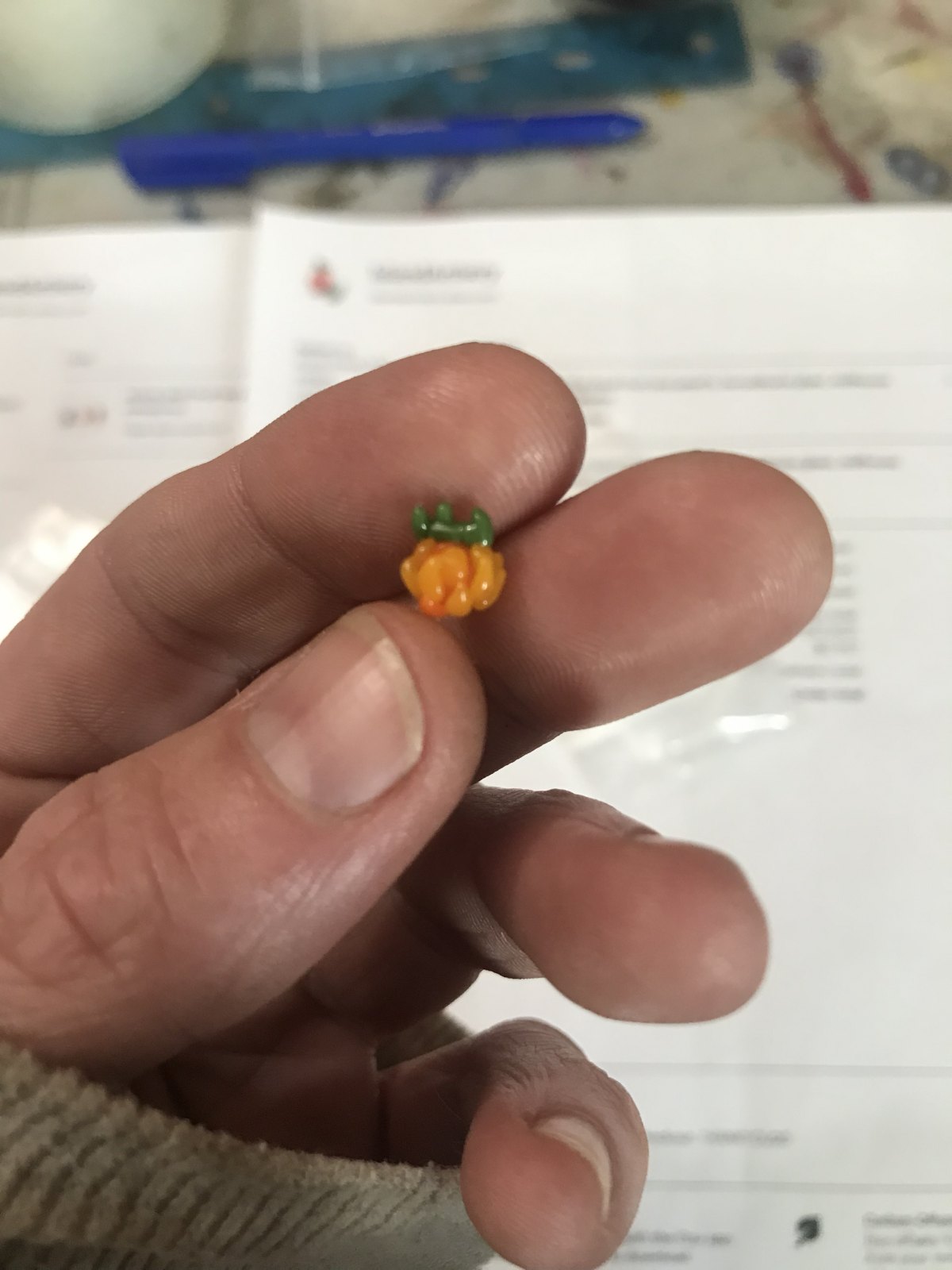 Mini handcrafted borosilicate glass art bead Burning fruit